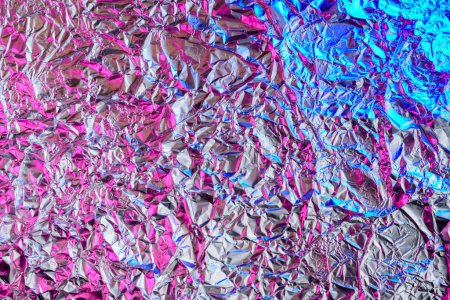 Foto de Fondo de lámina rosa y azul con superficie arrugada brillante para el fondo de textura - Imagen libre de derechos