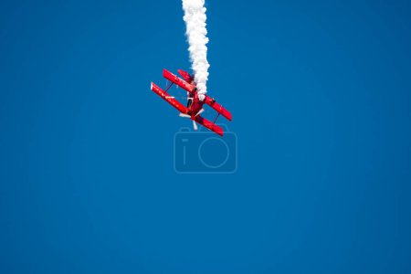 Photo for The red and white smoke of the smoke on the air - Royalty Free Image