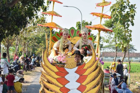 Photo for Tuban Indonesia August 29, 2023, people wearing Traditional Javanese Empire Custome in commemoration of the 78th Anniversary of the Republic of Indonesia at Dasin Village Tambakboyo district. - Royalty Free Image