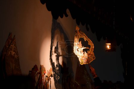 Photo for Wayang kulit or traditional javanese puppet is played on the stage - Royalty Free Image