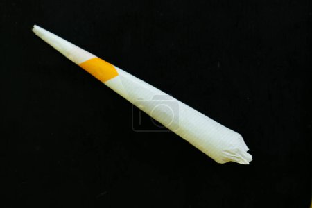 Photo for Close up cigarette handmade isolated on black background - Royalty Free Image