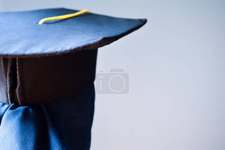 Photo for Head of Hijab female wear Toga hat or graduation hat behind view, greaduation education hijab female. - Royalty Free Image