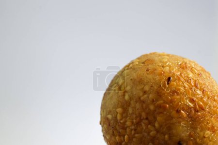 Photo for Onde onde is typical and traditional javanese indonesian food like mochi and peanut inside, isolated white background - Royalty Free Image