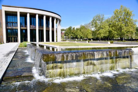 Photo for Nashville, TN, USA, September 24, 2019. Waterfall outside The Tennessee State Museum. Blue sky and trees. - Royalty Free Image