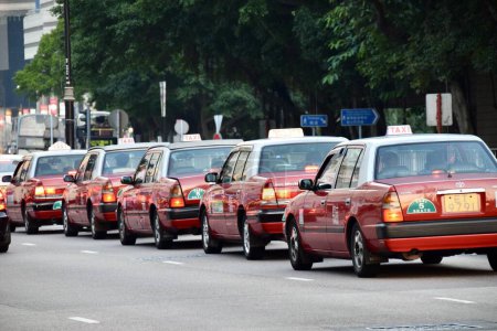 Red Classic Toyota Crown Victoria Taxis. Hong Kong. November 11, 2018.