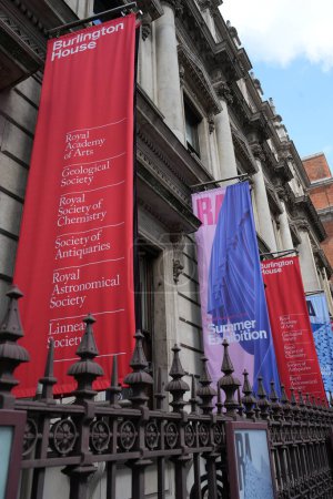 Photo for Banners outside Burlington House, including The Royal Academy Summer Exhibition. London, UK, August 17, 2023. - Royalty Free Image