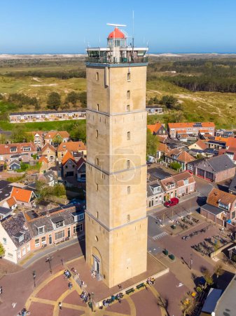Photo for Lighthouse Brandaris on the island Terschelling, the Netherlands. Vertical image of this historic brick lighthouse under a blue sky in summer. Wadden island Terschelling. High quality photo - Royalty Free Image