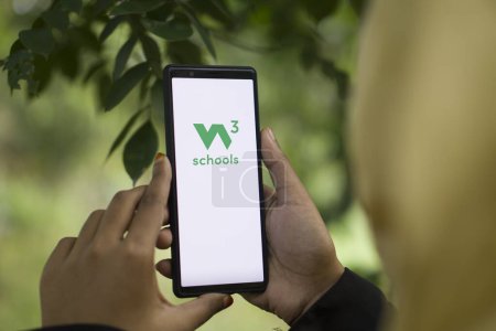 Photo for Dhaka, Bangladesh - 25 December 2023: w3schools logo seen displayed on a smartphone. W3Schools is a freemium educational website for learning coding online. - Royalty Free Image