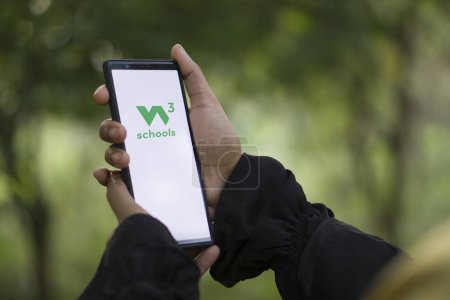 Photo for Dhaka, Bangladesh - 25 December 2023: w3schools logo seen displayed on a smartphone. W3Schools is a freemium educational website for learning coding online. - Royalty Free Image
