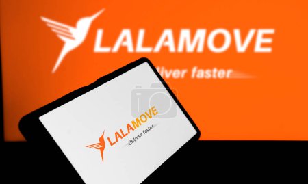Photo for Dhaka, Bangkadesh- 17 February 2024: Lalamove logo is displayed on smartphone. - Royalty Free Image
