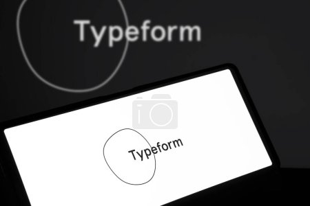 Photo for Dhaka, Bangladesh- 19 February 2024: Typeform logo is displayed on smartphone. - Royalty Free Image