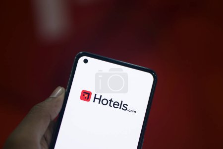 Photo for Dhaka, Bangladesh- 13 March 2024: Hotels.com logo is displayed on smartphone. - Royalty Free Image