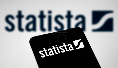 Photo for Dhaka, Bangladesh- 20 March 2024: Statista.com logo is displayed on smartphone. - Royalty Free Image