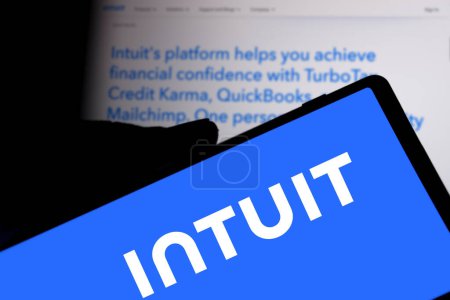 Photo for Dhaka, Bangladesh- 15 Apr 2024: Intuit logo is displayed on smartphone. Intuit Inc. is an American multinational business software company. - Royalty Free Image