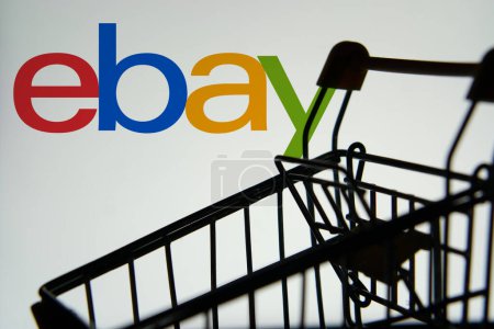 Photo for Dhaka, BD- 29 May 2024: A silhouette of a shopping cart is in front of the Ebay.com - Royalty Free Image