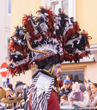 Photo for Villach, Austria - 2023 February 19: Carnival in Villach, Fasching, Participants in the annual parade wear colorful and masquerade clothing. Motto: Lei-Lei. - Royalty Free Image