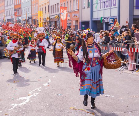 Photo for Villach, Austria - 2023 February 19: Carnival in Villach, Fasching, Participants in the annual parade wear colorful and masquerade clothing. Motto: Lei-Lei. - Royalty Free Image