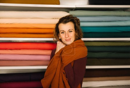 Warm and Inviting Fashion Designer in Her Textile Shop