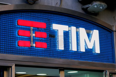 Foto de TIM logo of a shop in Naples. The telecommunications company Telecom Italia is listed on the Italian Stock Exchange with the ticker TIT and is included in the Ftse Mib index. - Imagen libre de derechos