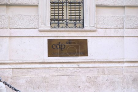 Photo for The modern logo of Cassa Depositi e Prestiti (CDP) on a plaque outside the main office in Rome. - Royalty Free Image