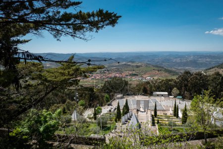 Photo for Access stairs to the Sanctuary of Our Lady of the Assumption with the village of Vilas Boas in the background in Tras os Montes, Portugal - Royalty Free Image