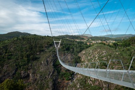 Partial view of the metal suspension bridge over the Paiva river in Arouca, Portugal