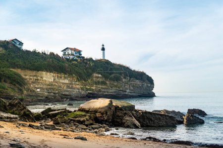 Photo for Petite chambre d'amour beach with the Phare de Biarritz lighthouse in the background - Royalty Free Image