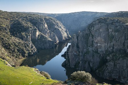 Between large cliffs the Douro river near the village of Miranda do Douro in Tras os Montes, Portugal