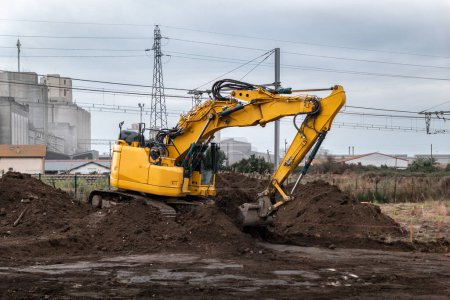 Residential foundations: Use of a rotating backhoe to prepare land for residential buildings