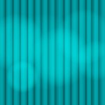 Turquoise curtains illuminated by multiple lights. A horizontal background material of refreshing blue green pleated cloth