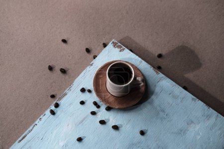 Photo for Cup of turkish coffee, traditional hot beverage drink, beans, blue wooden background, fortune telling reading - Royalty Free Image