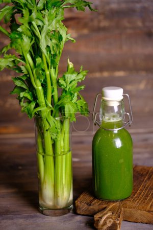 Photo for Jus Seledri. celery juice in clear bottle - Royalty Free Image