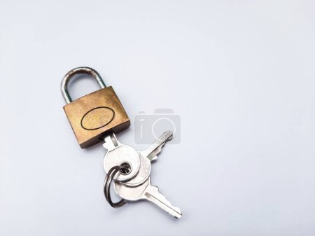 Photo for Closed padlock and key on white background - Royalty Free Image
