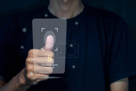 A man unlocks a smart phone by scanning fingerprint on virtual screen. Security access with biometric identification concept.