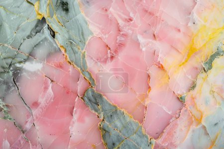 This stunning image captures a natural tapestry of blush marble, with delicate rosy veins and slate gray whispers, all interwoven with threads of gold. It presents a soft yet striking balance.
