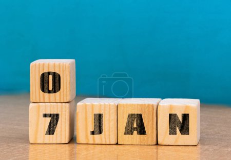 Photo for Cube shape calendar for January 07 on wooden surface with empty space for text,cube calendar for January on wood background - Royalty Free Image