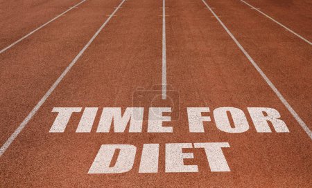 Téléchargez les photos : Time For Diet écrit sur piste de course, Nouveau Concept sur piste de course texte en couleur blanche - en image libre de droit