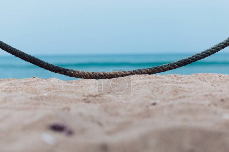 Mooring rope wallpaper, sand and ocean background