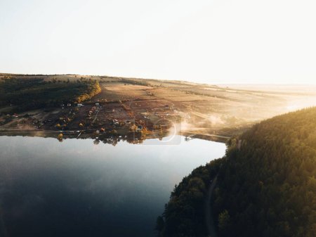 Foto de Beautiful Sunrise over the lake in autumn season, rural landscape from above - Imagen libre de derechos