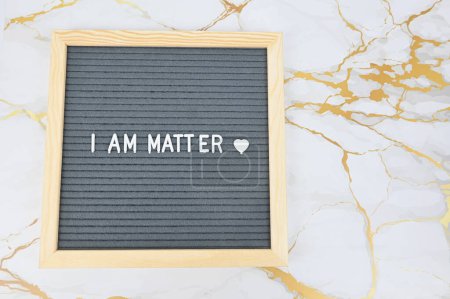Grey letter board with phrase I am matter, self love, self care. Mindfulness lifestyle, mental health. Aspiration and supportive sentence