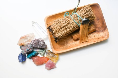 Photo for Smudge kit for spiritual practices with natural elements: Palo Santo sticks, dried white sage. Ritual spirituality, self care mind and soul practicing. Mindfulness living. - Royalty Free Image