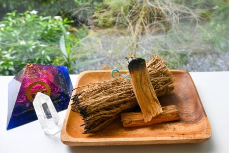 Photo for Smudge kit for spiritual practices with natural elements: Palo Santo sticks, dried white sage. Ritual spirituality, self care mind and soul practicing. Mindfulness living. - Royalty Free Image