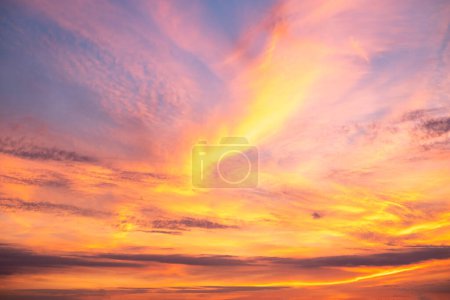 Beautiful , luxury soft gradient orange gold clouds and sunlight on the blue sky perfect for the background, take in everning,Twilight