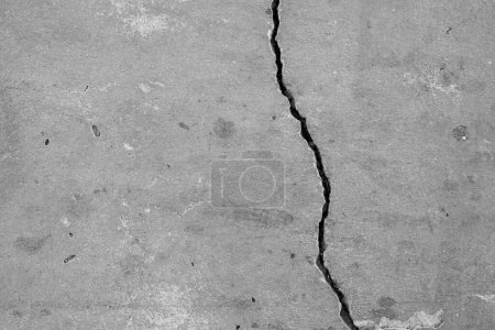 Photo for Cracked concrete wall broken wall at the outside cement corner that effected with earthquake and collapsed ground - Royalty Free Image