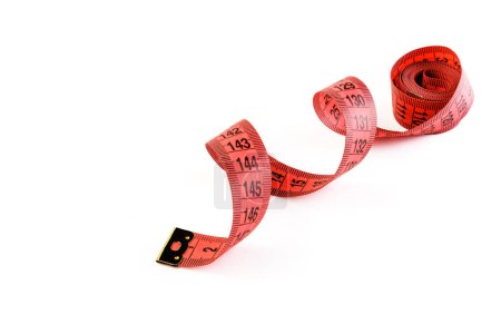 Photo for Red measuring tape isolated on white background. Measuring tape for fitness. Close-up - Royalty Free Image