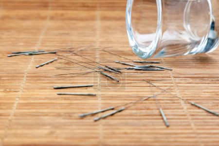 Photo for Acupuncture needles. Silver needles for traditional Chinese medicine acupuncture. Close-up. There is some free space for your text or sign. - Royalty Free Image