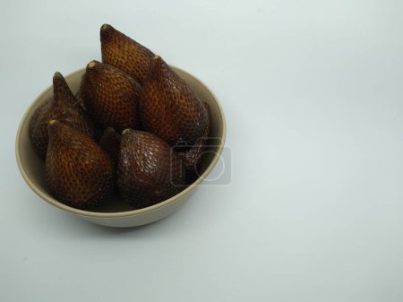 salak fruit in a gray bowl