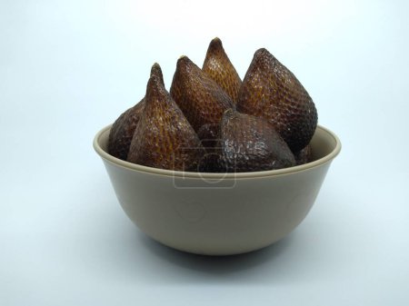 salak fruit in a gray bowl