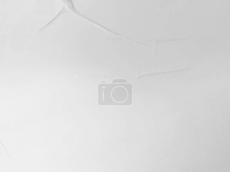Photo for Blank white glued paper for poster texture overlay. Crumpled and wrinkled for background. matted wet paper for mockup posters, flyer, brochure, and banner design - Royalty Free Image