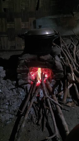 Photo for Traditional rural stove for cooking using firewood - Royalty Free Image